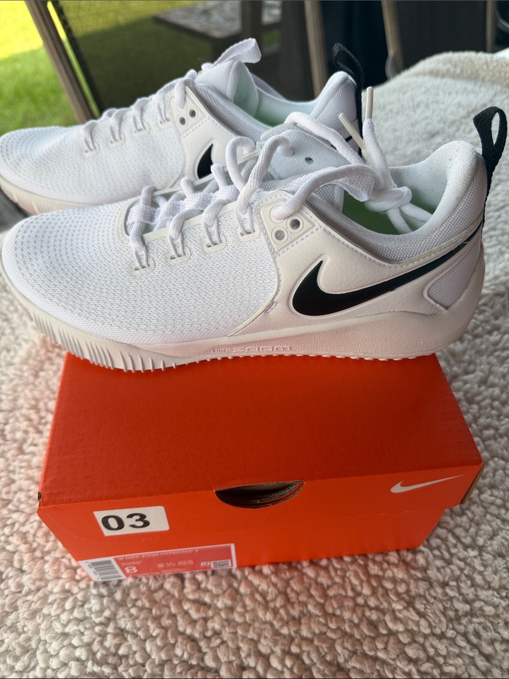 Nike White Sneakers with Black Swoosh